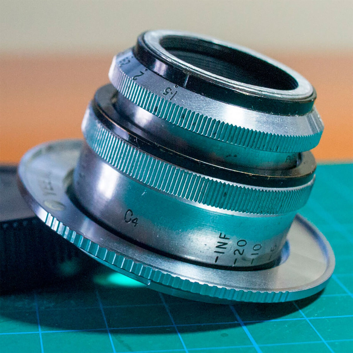 M23.5x0.5 male to M52x0.75 female filter step-up ring (Cooke Kinic 1.5/1″ lens)
